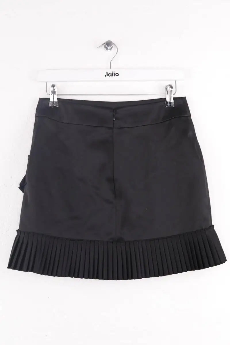 Jupe plissée The Kooples Noir en Synthétique