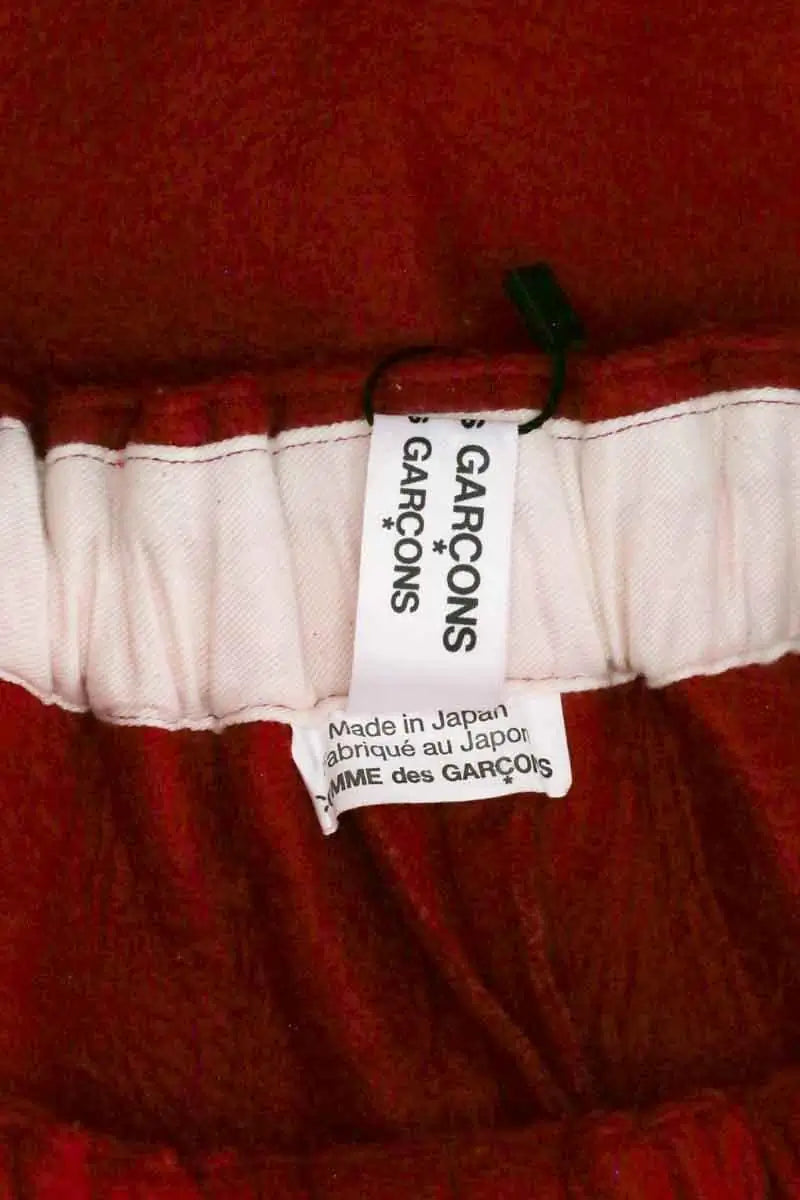 Bermuda Comme Des Garçons Rouge en Synthétique