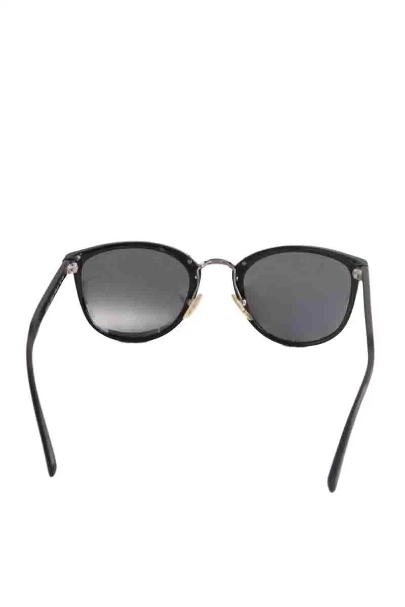 Lunettes de soleil Prada Noir en Plastique