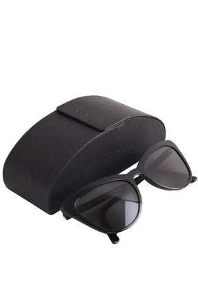 Lunettes de soleil Prada Noir en Plastique