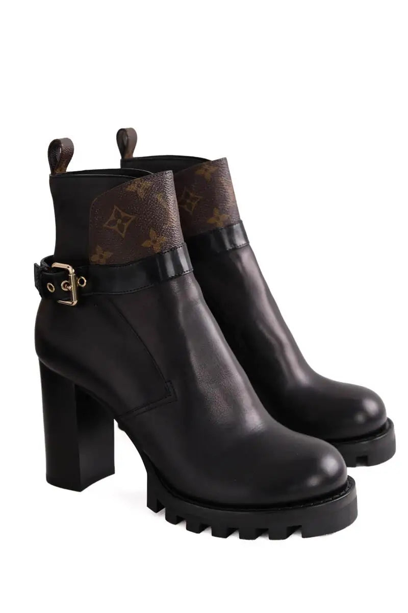 Boots à boucles Louis Vuitton Noir en Cuir