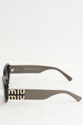 Lunettes de soleil Miu Miu  Noir