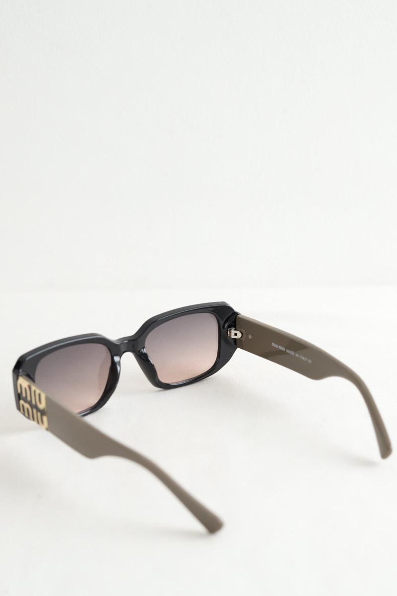 Lunettes de soleil Miu Miu  Noir