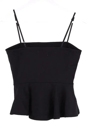 Top sans manche L'agence Parisa peplum top Noir en Synthétique