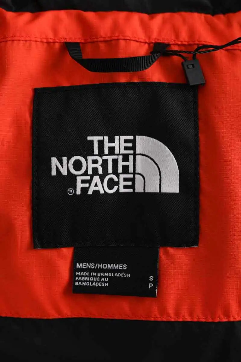 Doudoune The North Face Orange en Synthétique