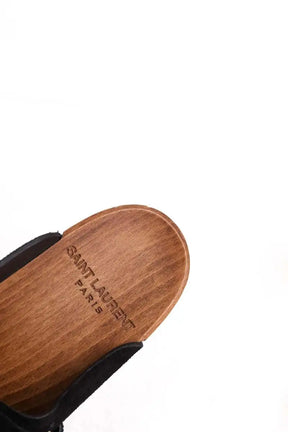 Sabots Saint Laurent Studded accents slides Noir en Daim