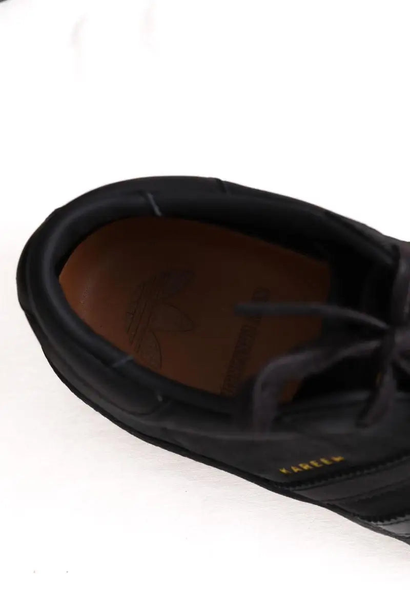 Baskets basses Adidas Noir en Cuir