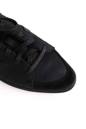 Baskets basses Adidas Noir en Cuir
