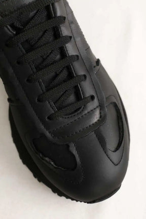 Baskets basses Maison Martin Margiela Noir en Cuir