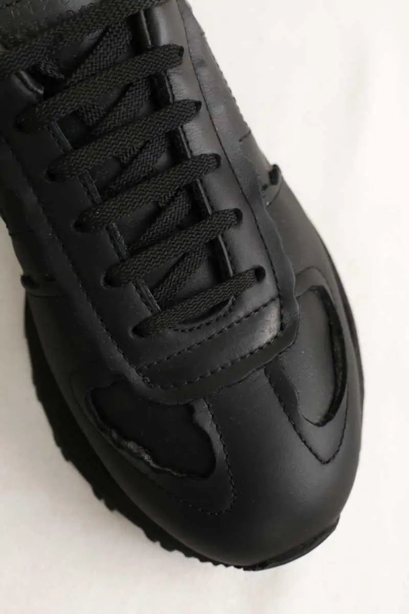 Baskets basses Maison Martin Margiela Noir en Cuir