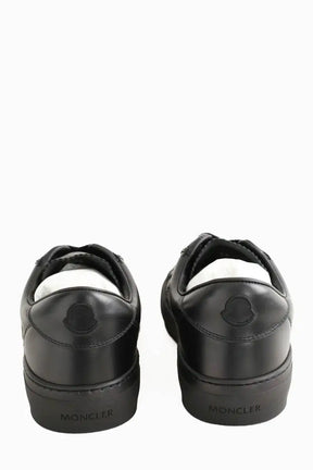 Baskets basses Moncler Noir en Cuir