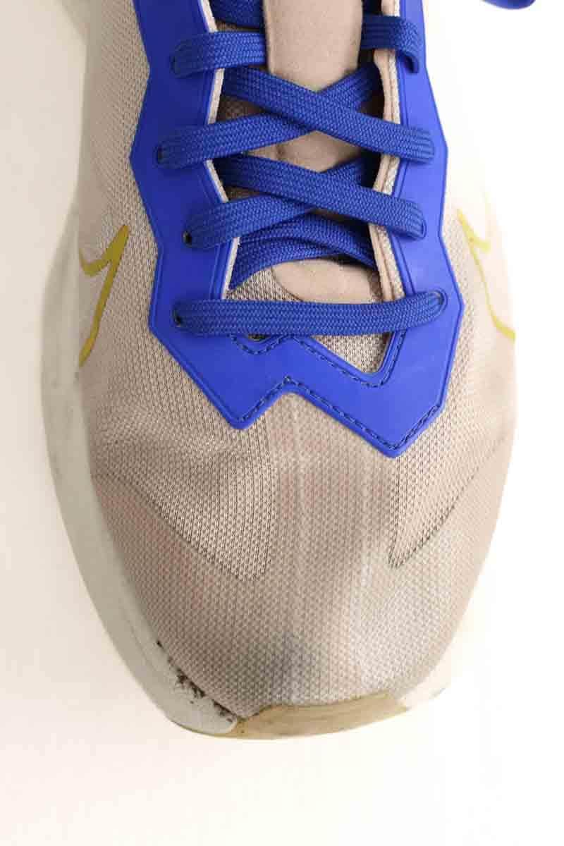 Baskets basses Nike Beige en Tissu