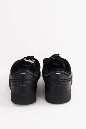 Baskets basses Reebok Noir en Tissu
