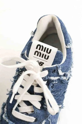 Baskets Miu Miu 574 demin Bleu en Tissu