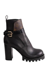 Boots à boucles Louis Vuitton Noir en Cuir, taille 40 - Seconde Main