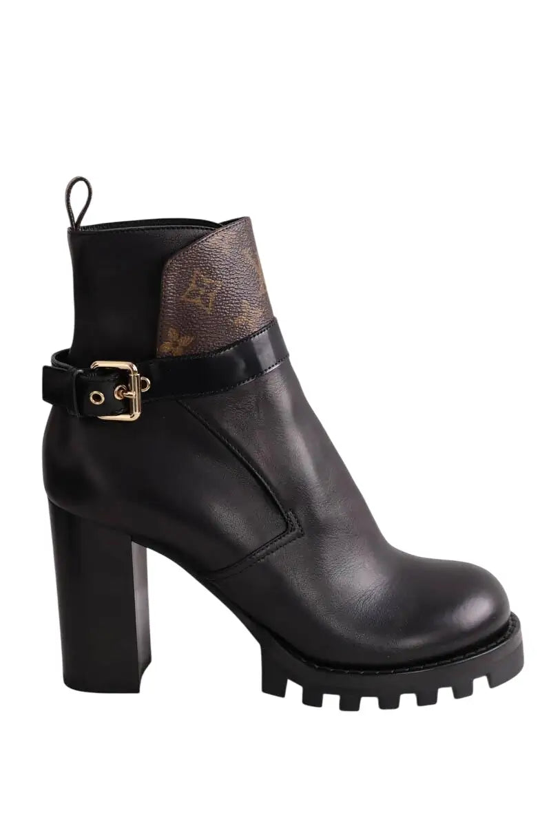Boots à boucles Louis Vuitton Noir en Cuir, taille 40 - Seconde Main