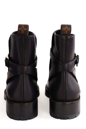 Boots à boucles Louis Vuitton Discovery Flat Noir en Cuir