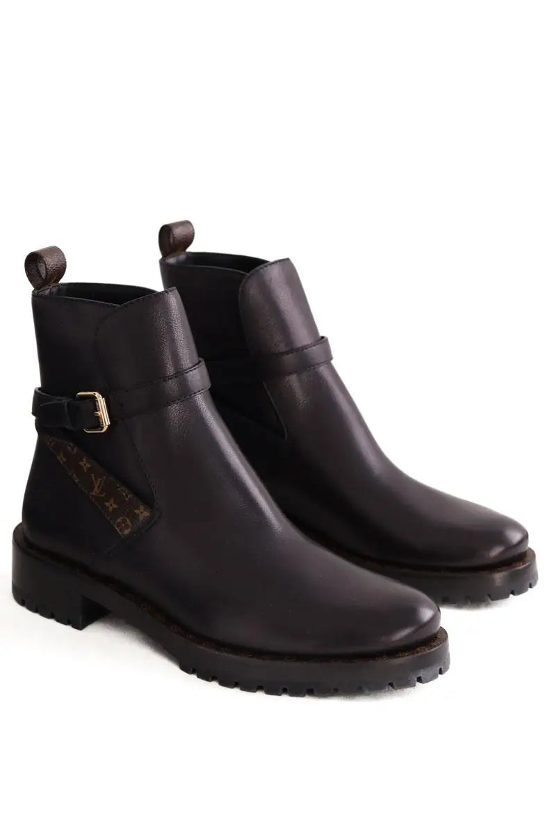 Boots à boucles Louis Vuitton Discovery Flat Noir en Cuir