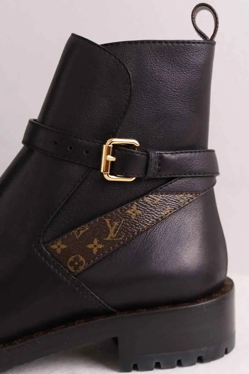 Boots à boucles Louis Vuitton Discovery Flat Noir en Cuir