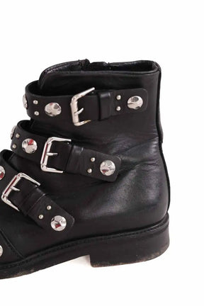 Boots à boucles Maje Noir en Cuir