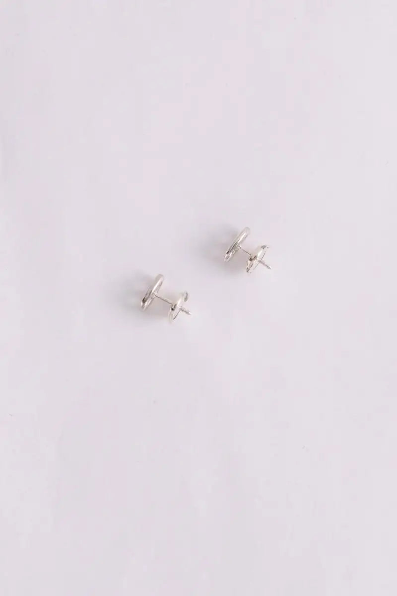 Boucles d'oreilles Hermès Farandole Argent en Argent