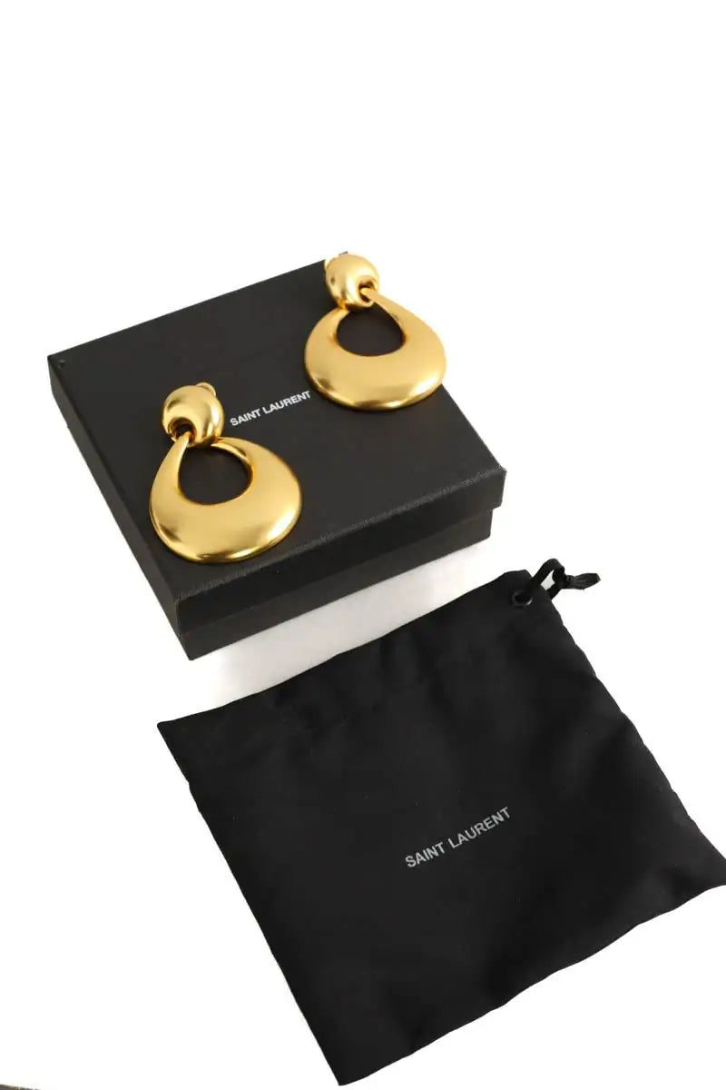 Boucles d'oreilles Saint Laurent Doré en Métal