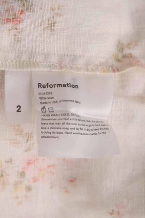 Robe Reformation Beige en Lin