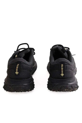 Baskets basses Nike Noir en Tissu