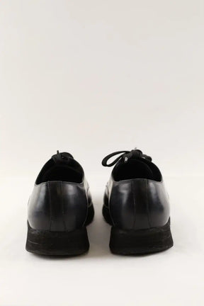 Chaussures à lacets Prada Noir en Cuir