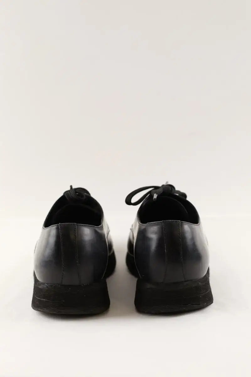 Chaussures à lacets Prada Noir en Cuir