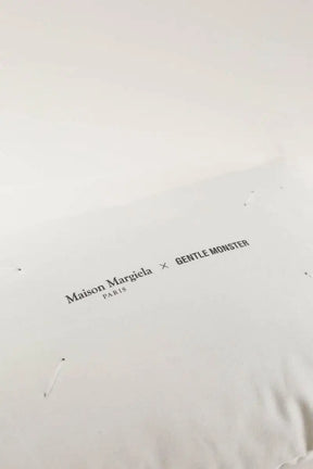 Coussin Maison Martin Margiela Blanc en 