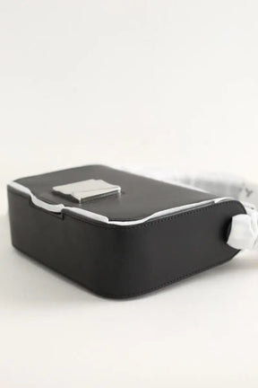 Sac à bandoulière Tumi  Noir
