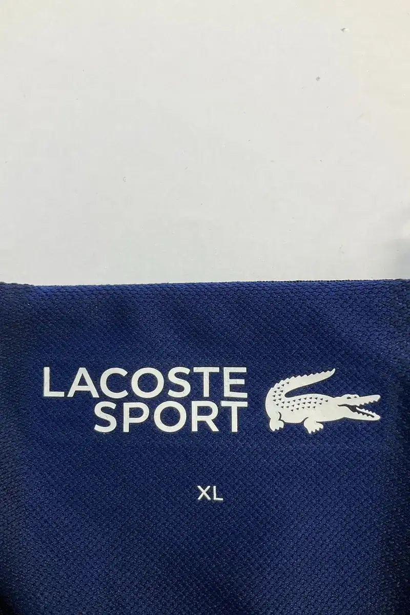 Polo Lacoste Bleu en Synthétique