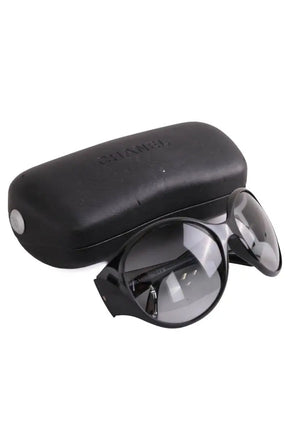 Lunettes de soleil Chanel Noir en Plastique