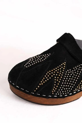 Sabots Saint Laurent Studded accents slides Noir en Daim