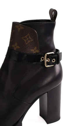 Boots à boucles Louis Vuitton Noir en Cuir