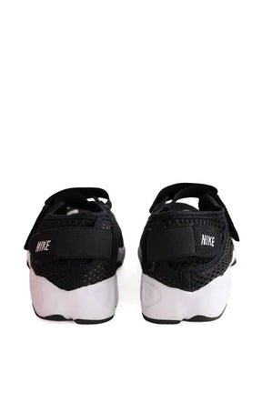 Baskets Nike Noir en Tissu