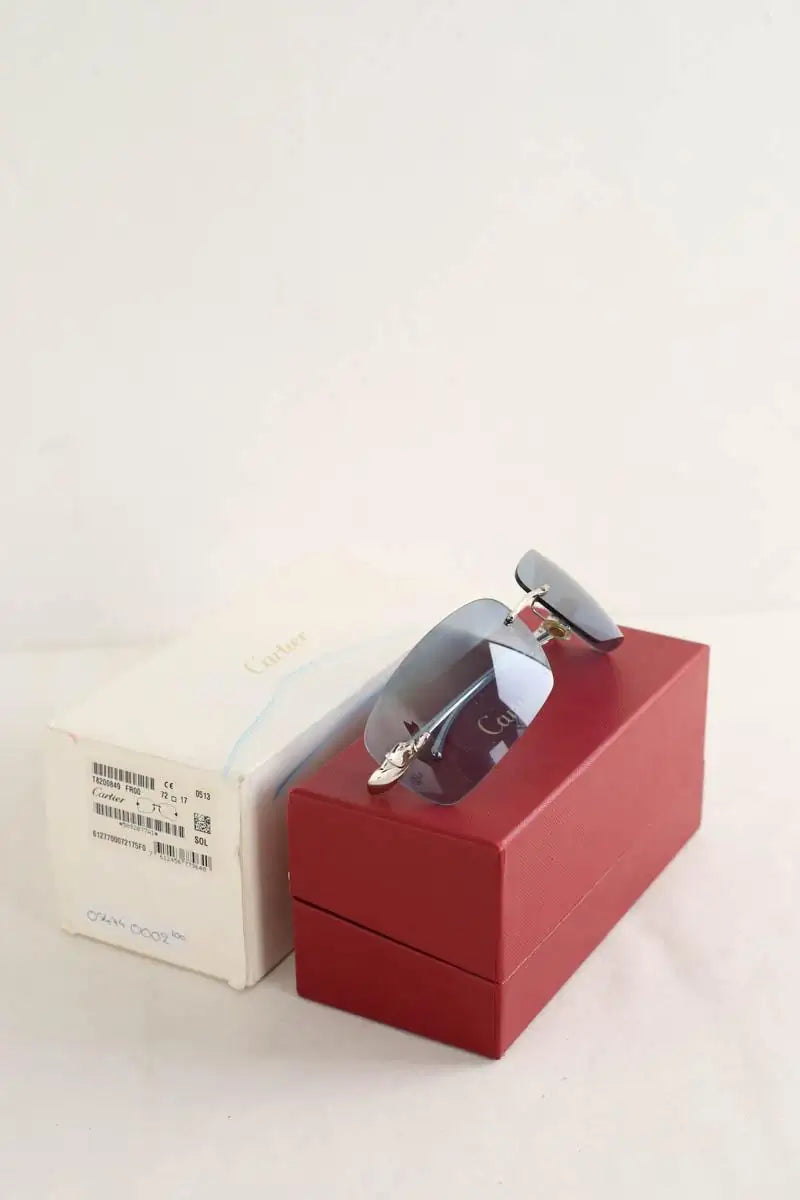 Lunettes de soleil Cartier Argent en Métal
