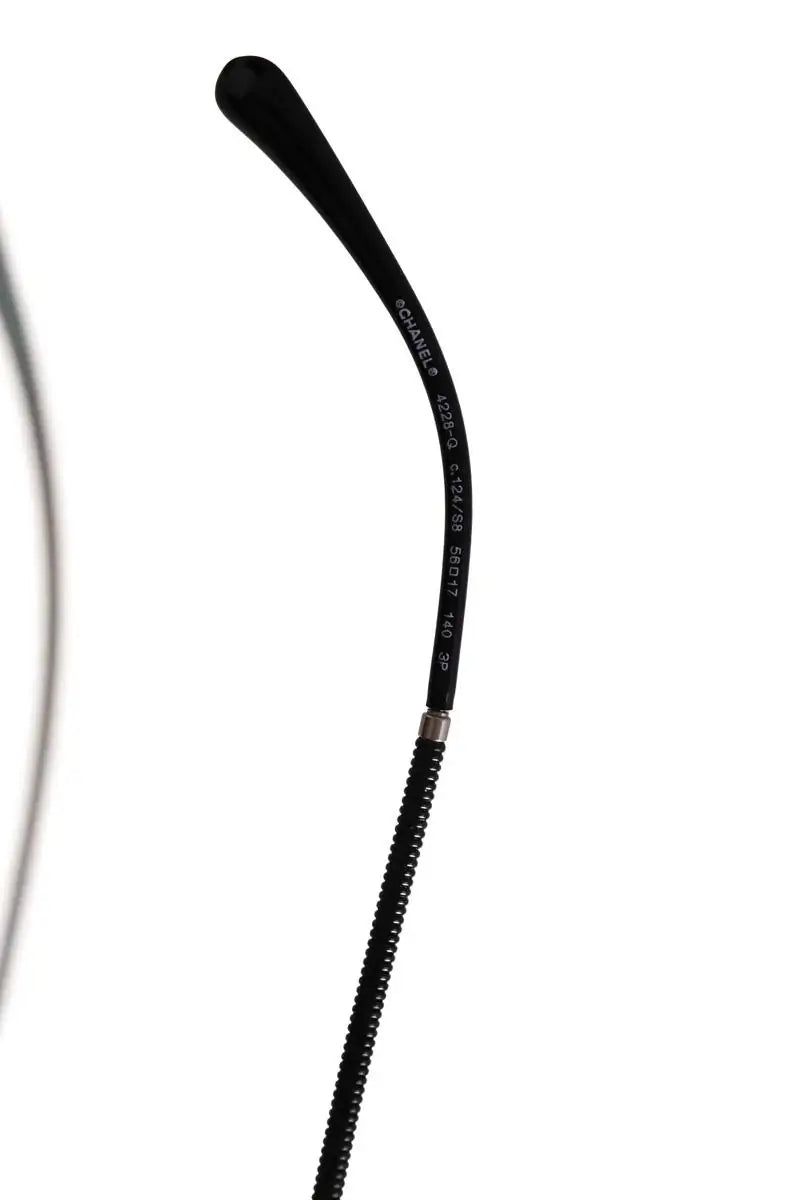 Lunettes de soleil Chanel Noir en Métal