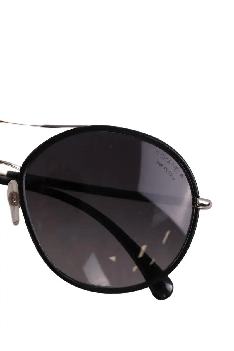Lunettes de soleil Chanel Noir en Métal
