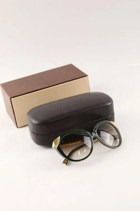 Lunettes de soleil Louis Vuitton Vert en Plastique