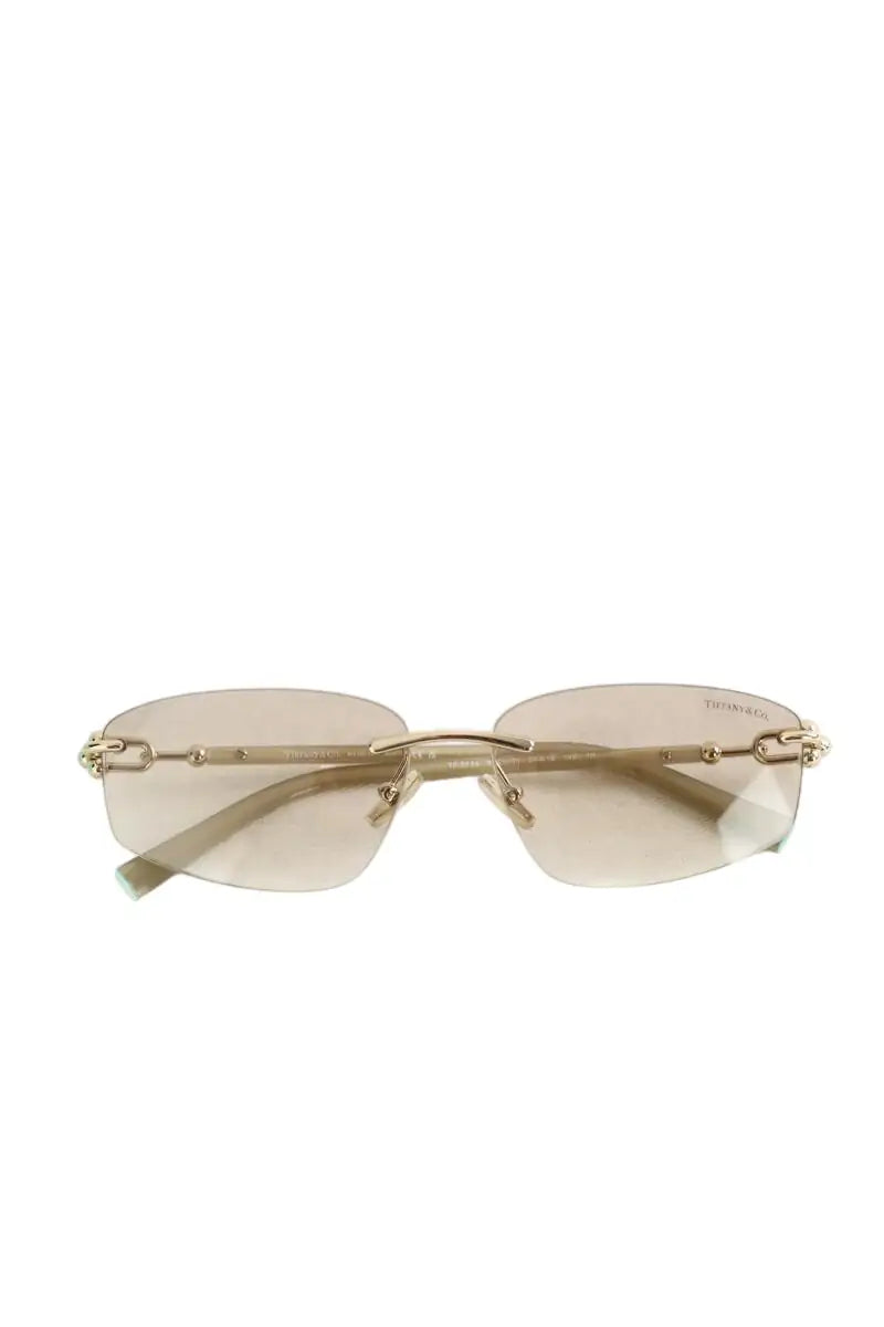 Lunettes de soleil Tiffany Marron en Plastique - Seconde Main
