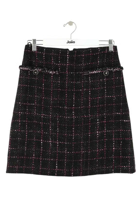 Mini jupe Chanel Noir en Tweed, taille M - Seconde Main