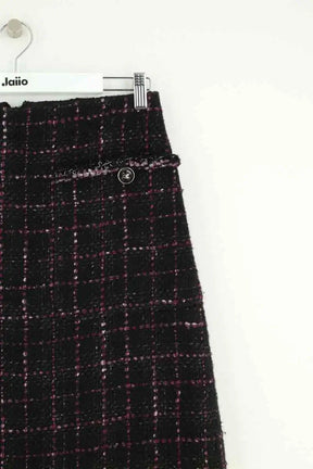 Mini jupe Chanel Noir en Tweed