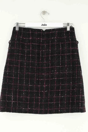 Mini jupe Chanel Noir en Tweed