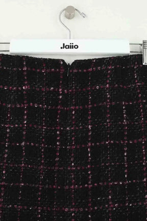 Mini jupe Chanel Noir en Tweed