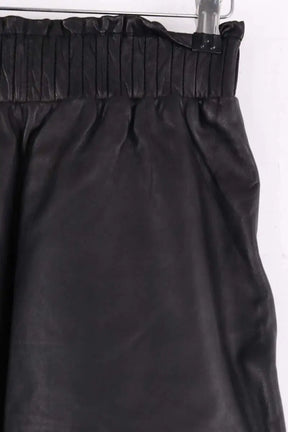 Mini jupe Karma Koma Noir en Cuir