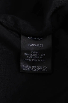 Mini jupe Karma Koma Noir en Cuir