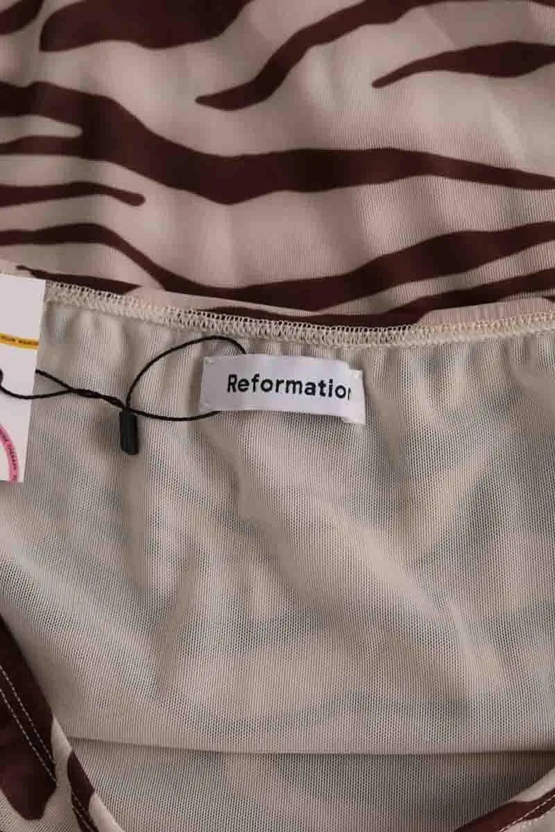 Mini jupe Reformation Ecru en Synthétique