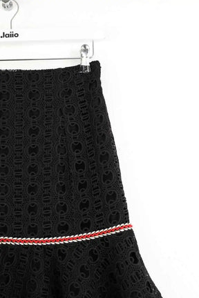 Mini jupe Sandro Noir en Polyester